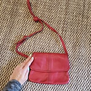 Red leather crossbody bag.